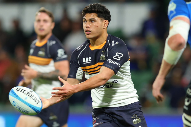 Noah Lolesio passes the ball during the round 15 Super Rugby Pacific match between Western Force and Brumbies.