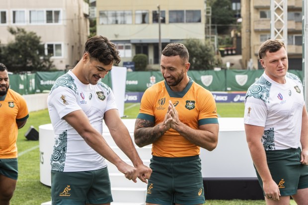 Wallabies Jordan Petaia and Quade Cooper have a chat at Coogee Oval. Photo: Steven Siewert