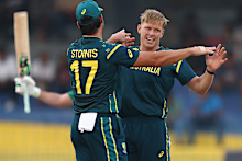 Nathan Ellis of Australia celebrates after taking the wicket of Curtis Campher of Ireland.