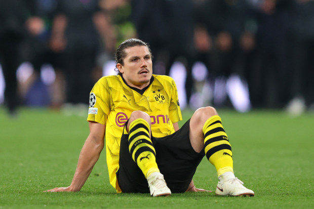 Marcel Sabitzer of Borussia Dortmund reacts at fulltime.