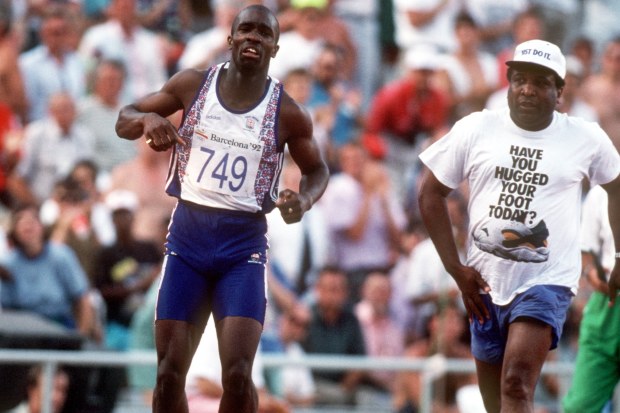 Derek Redmond's dad Jim rushing to help his son at the Barcelona 1992 Olympics.