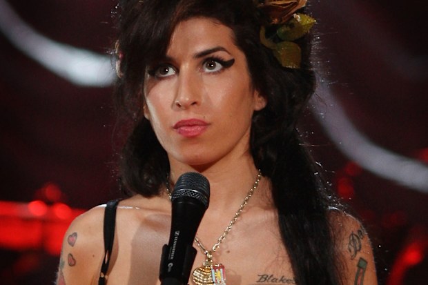 British singer Amy Winehouse performs at The Riverside Studios for the 50th Grammy Awards ceremony via video link on February 10, 2008 in London, England.