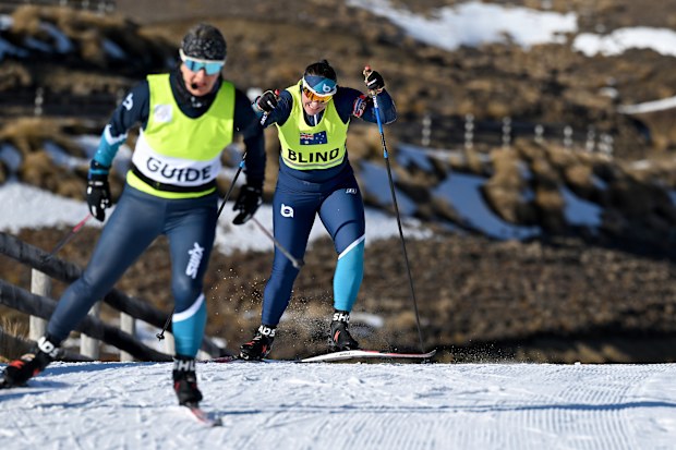 Taryn Dickens, guided by Lynn Maree Cullen, competing at Milano Cortina.