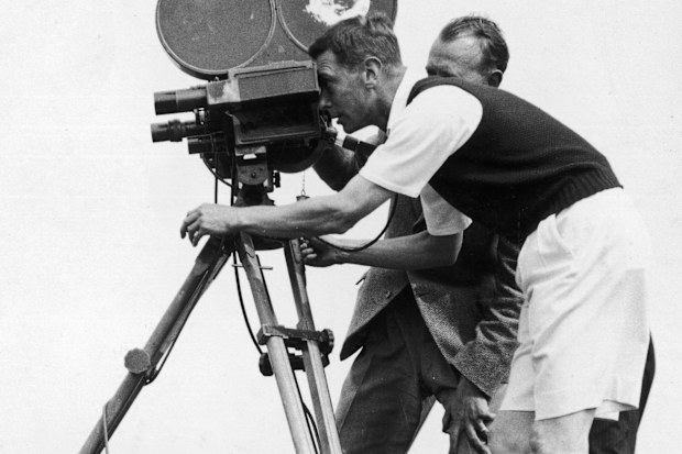 King George VI, as the Duke of York, filming with a cine camera at his camp at Southwold on August 7, 1935 (Photo by Central Press/Getty Images)