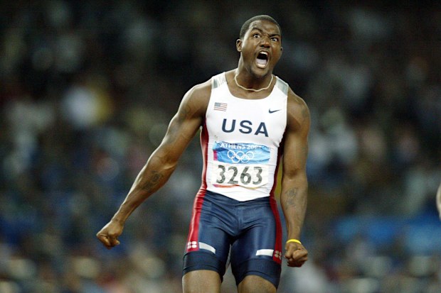 Justin Gatlin winning the 100m dash at the 2004 Olympics.