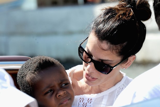 Sandra Bullock with son Louis during the 70th Venice International Film Festival on August 27, 2013 in Venice, Italy.