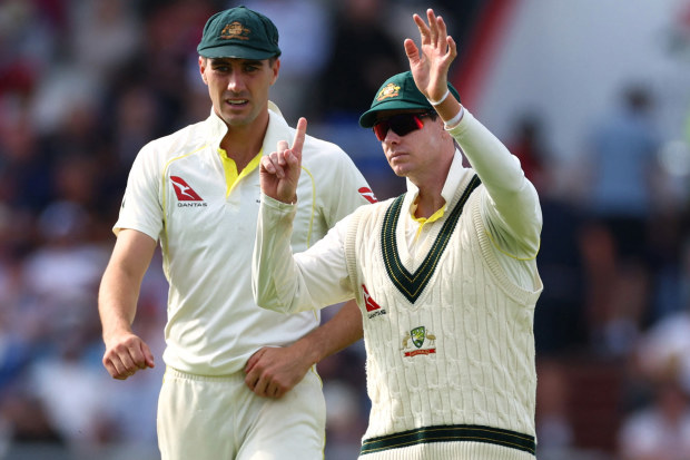 Australia's Steve Smith with captain Pat Cummins at Old Trafford.