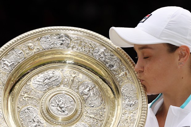 Ashleigh Barty celebrates winning Wimbledon with Venus Rosewater Dish trophy