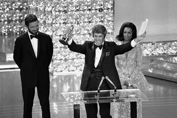 Composer Burt Bacharach accepts the Oscar for Best Original Score for "Butch Cassidy and the Sundance Kid" at the Academy Awards in Los Angeles on April 7, 1970. 