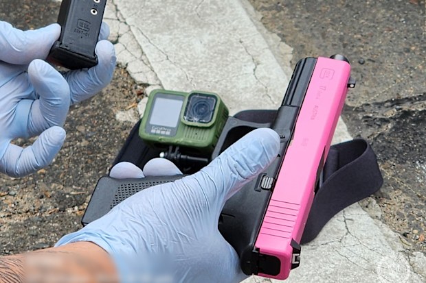 A pink gun, green GoPro and ammunition seized by police in an attempted hitjob.