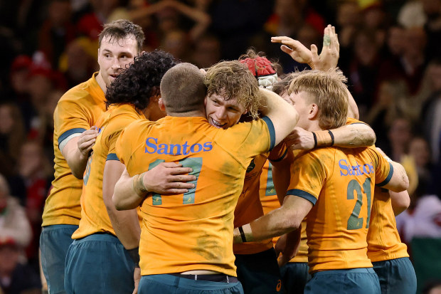 Wallabies players celebrate their side's victory over Wales in the final Spring Tour Test of the year.