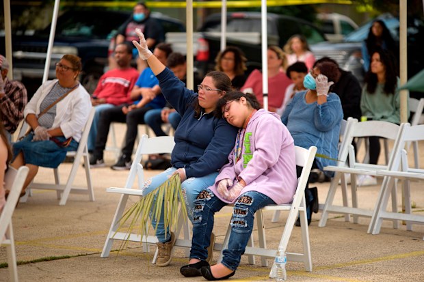 US churches hold Palm Sunday services despite state bans on gatherings