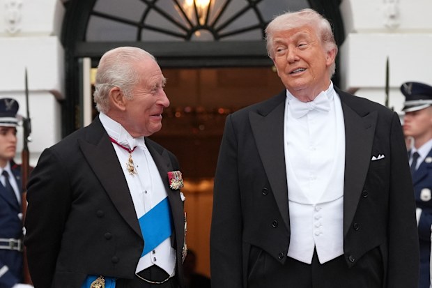 President Donald Trump greets Britain's King Charles III 