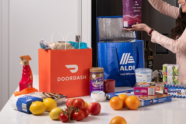 aldi doordash partnership trial in canberra head of expansion grocery delivery