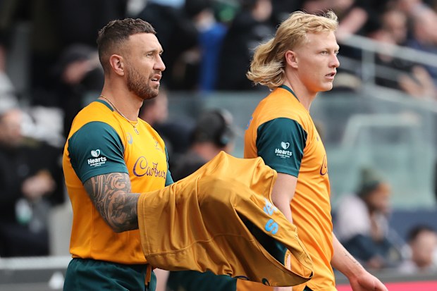 Quade Cooper (left) and Carter Gordon warm up before The Rugby Championship & Bledisloe Cup match between the All Blacks and Wallabies in Dunedin.
