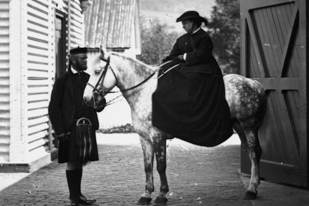 Queen Victoria (1819 - 1901) and her personal attendant John Brown (1826 - 1883) ready for a ride at Balmoral.   (Photo by W & D Downey/Hulton Archive/Getty Images)