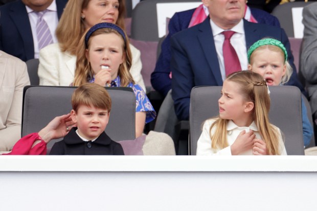 (L-R 3rd row) Victoria Starmer, Keir Starmer, (2nd row) Mike Tindall, Mia Tindall, Lena Tindall, Zara Tindall, (front row) Catherine, duchess of Cambridge, Prince Louis of Cambridge, Princess Charlotte of Cambridge and Prince George of Cambridge attend the Platinum Pageant on June 05, 2022 in London, England.