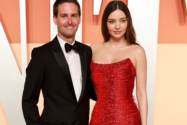 Evan Spiegel and Miranda Kerr attend the 2025 Vanity Fair Oscar Party Hosted By Radhika Jones at Wallis Annenberg Center for the Performing Arts 
