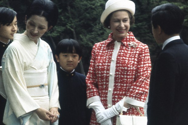 Queen Elizabeth II talks with Crown Prince Akihito and Crown Princess Michiko and their children during her one and only visit to Japan in 1975 