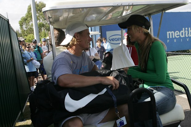 Lleyton Hewitt and Bec Hewitt (then dating) during practice at the Medibank International at Olympic Park at the Australian Open 2005.