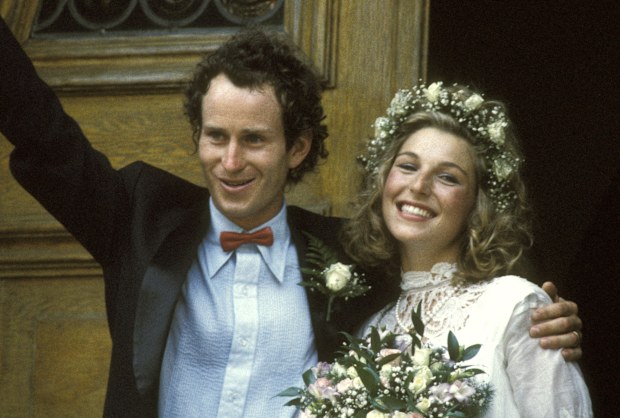 Tennis player John McEnroe and actress Tatum O'Neal on their wedding day in 1986