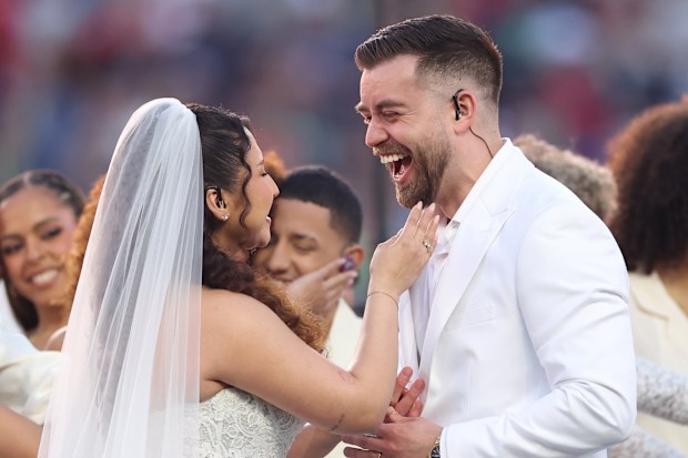A couple marries during the Bad Bunny performance at the Super Bowl LX Halftime Show at Levi's Stadium on February 8, 2026 in Santa Clara, California. 
