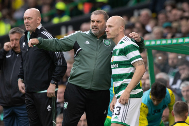Celtic manager Ange Postecoglou speaks to Aaron Mooy.