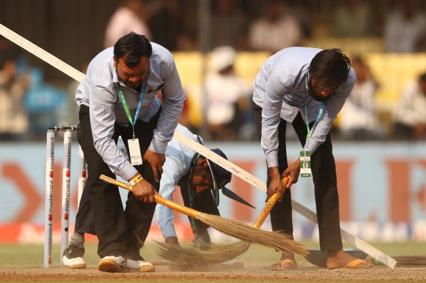 INDORE, INDIA - MARCH 01: The pitch is swept at the drinks break during day one of the Third Test match in the series between India and Australia at Holkare Cricket Stadium on March 01, 2023 in Indore, India. (Photo by Robert Cianflone/Getty Images)