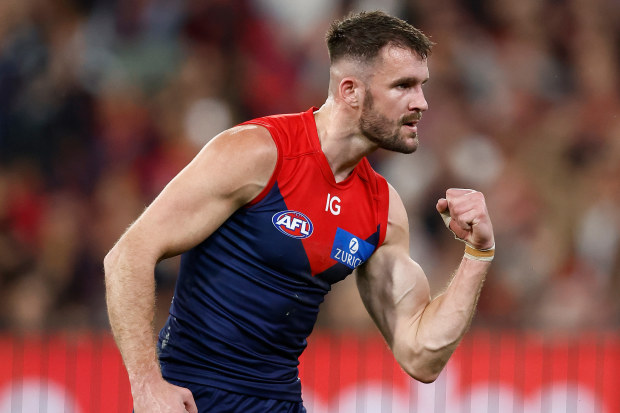 Joel Smith of the Demons celebrates a goal during the 2023 AFL first semi-final match between the Melbourne Demons and the Carlton Blues.