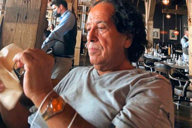In this photo provided by Ibrahim Almadi, Saad Ibrahim Almadi sits in a restaurant in an unidentified place, in the United States, on August 2021