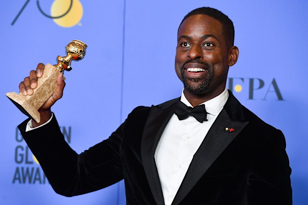 Sterling K. Brown holds his award for Best Performance by an Actor In A Television Series Drama in 'This Is Us'