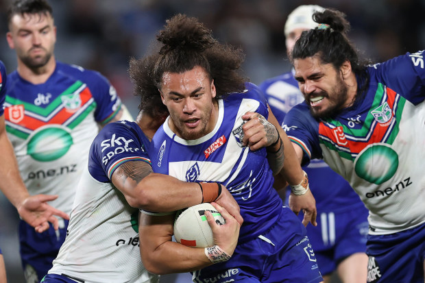 Raymond Faitala-Mariner of the Bulldogs is tackled during the round 11 NRL match between Canterbury Bulldogs and New Zealand Warriors at Accor Stadium on May 12, 2023 in Sydney, Australia. (Photo by Brendon Thorne/Getty Images)