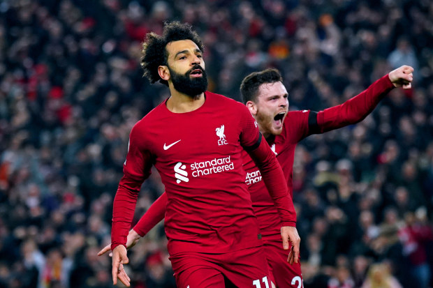 Liverpool's Mohamed Salah celebrates scoring their side's first goal of the game during the Premier League match at Anfield, Liverpool. Picture date: Monday February 13, 2023. (Photo by Peter Byrne/PA Images via Getty Images)