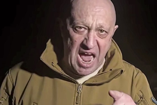 FILE - In this handout image taken from a video released by Prigozhin Press Service on Friday, May 5, 2023, head of Wagner Group Yevgeny Prigozhin stands in front of multiple bodies lying on the ground in an unknown location. The president of Belarus says the mercenary leader who led a short-lived mutiny against the Kremlin is in Russia and his troops are in their field camps. (Prigozhin Press Service via AP, File)