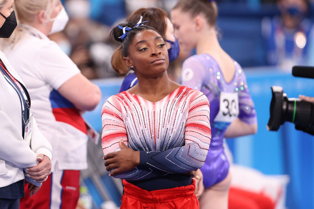 Simone Biles of Team United States looks on during the Women's Balance Beam Final on day eleven of the Tokyo 2020 Olympic Games.
