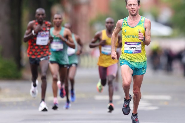 Liam Adams leading the field at the Birmingham 2022 Commonwealth Games.
