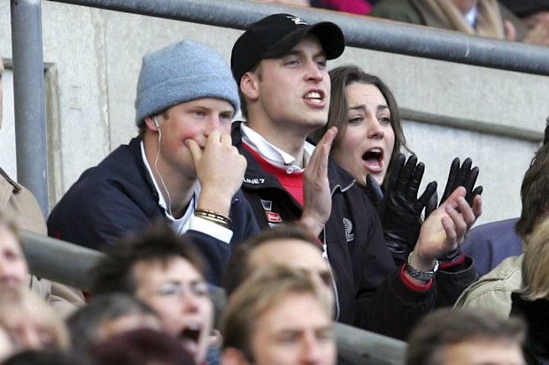 Britain's Prince William, center, with his then gilrfriend Kate Middleton and Prince Harry watch the England against Italy Six Nations rugby match at Twickenham stadium in London, Saturday Feb. 10, 2007. 