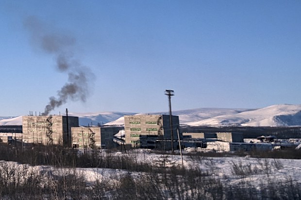 Smoke rises from a building in the town of Kharp, in the Yamalo-Nenetsk region about 1,900 kilometres northeast of Moscow, Russia, on Saturday, Feb. 17, 2024