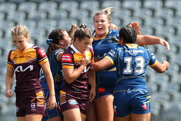 Ellie Johnston of the Eels celebrates a try against the Broncos.