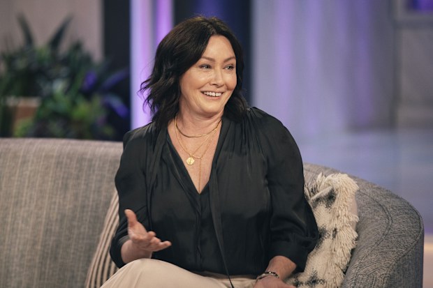 Shannen Doherty is pictured on "The Kelly Clarkson Show." Doherty isn't letting any of the challenges life has thrown at her get in the way of launching an exciting new project.
