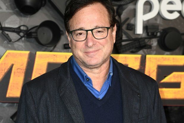Bob Saget attends the red carpet premiere & party for Peacock's new comedy series "MacGruber" at California Science Center on December 08, 2021 in Los Angeles, California. 