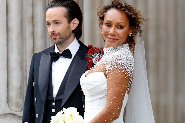 Rory McPhee and Mel B depart following their wedding in the OBE (Order of the British Empire) Chapel at St Paul's Cathedral on July 5, 2025 in  London, England. 