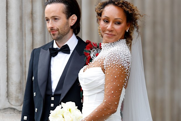 Rory McPhee and Mel B depart following their wedding in the OBE (Order of the British Empire) Chapel at St Paul's Cathedral on July 5, 2025 in  London, England. 