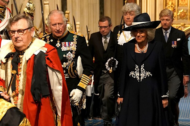 Camilla, Duchess of Cornwall and Prince Charles, Prince of Wales arrive at the Sovereign's Entrance ahead of the State Opening of Parliament at Houses of Parliament on May 10, 2022 in London, England