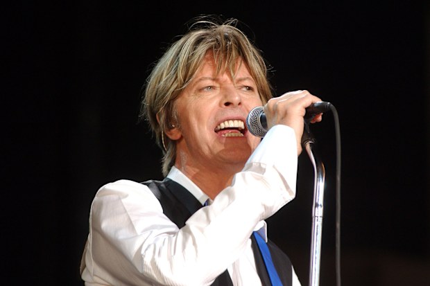 David Bowie, singing on stage