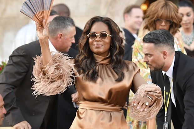 Oprah Winfrey leaves a hotel during celebrations for Jeff Bezos and Lauren Sanchez Bezos' wedding, in Venice, Saturday, June 28, 2025. (AP Photo/Luigi Costantini)