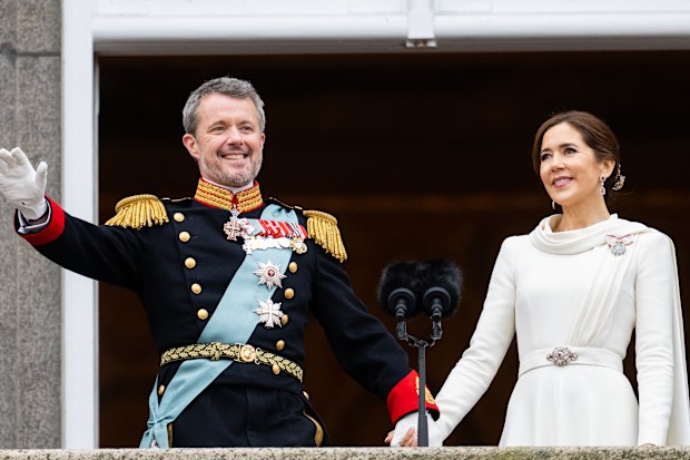 Danish King Frederik X and wife Queen Mary of Denmark after their proclamation by the Prime Minister, Mette Frederiksen on the balcony of Christiansborg Palace on January 14, 2024 in Copenhagen, Denmark. Her Majesty Queen Margrethe II steps down as Queen of Denmark and and entrusts the Danish throne to His Royal Highness The Crown Prince, who becomes His Majesty King Frederik X and Head of State of Denmark. (Photo by Samir Hussein/WireImage)