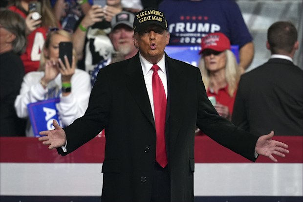 Republican presidential nominee former President Donald Trump arrives at a campaign rally at Atrium Health Amphitheater Sunday, Nov. 3, 2024, in Macon, Ga. (AP Photo/Mike Stewart)