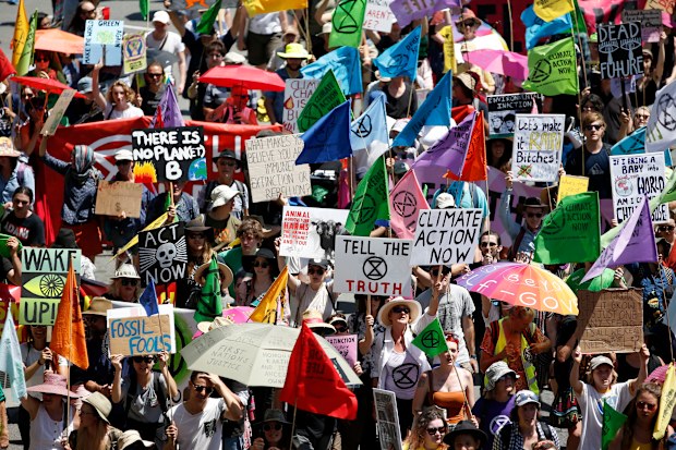 Extinction Rebellion activists march during Brisbane Rebellion Week, Brisbane, Monday, October 7, 2019. 