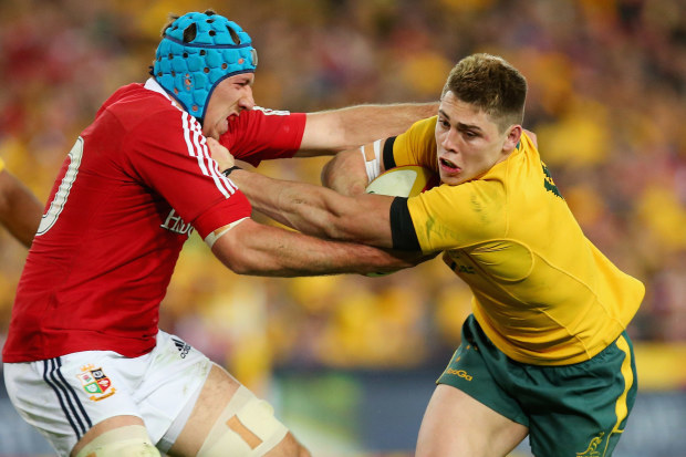 James O'Connor of the Wallabies is tackled by Justin Tipuric of the  Lions.